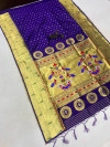 Purple color paithani silk saree with weaving work