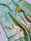 Light green color soft kanchipuram silk saree with zari weaving work