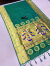 Rama green color paithani silk saree with weaving work