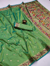 Pista green  color paithani silk saree with zari weaving work