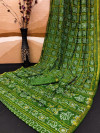 Mehndi green color soft bandhani silk saree with khadi printed work