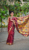 Maroon color soft paithani silk saree with golden zari weaving work