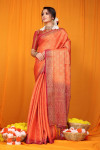 Orange color soft muslin silk saree with zari weaving work
