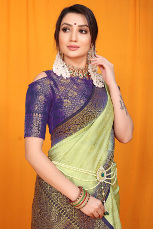 Pista green color soft muslin silk saree with zari weaving work