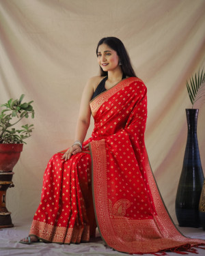 Red color banarasi silk saree with golden zari weaving work