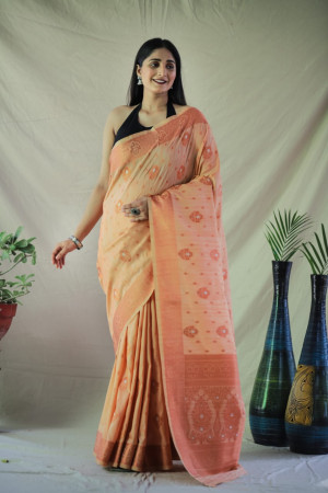 Peach color tussar silk saree with golden zari weaving work