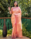 Peach color linen silk saree with golden zari weaving work