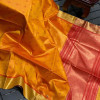 Orange color tussar silk saree with zari weaving work