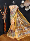 Yellow color tussar silk saree with kalamkari printed work