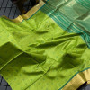 Parrot green color tussar silk saree with zari weaving work