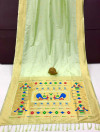 Pista green color paithani silk saree with zari woven work