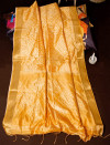 Yellow color soft tussar silk saree with bandhani printed work