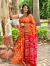 Orange and red color soft hand bandhej silk saree with zari weaving work