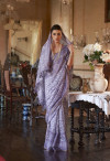 Purple color soft mulmul cotton saree with batik printed work