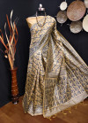 Beige color jamdani raw silk saree with woven design
