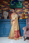 Beige color tussar silk saree with zari weaving work