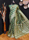 Bottlo green color jamdani raw silk saree with woven design