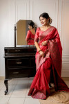 Gajari color handloom raw silk saree with woven design