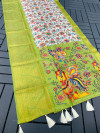 Off white and parrot green color banarasi silk saree with kalamkari printed work