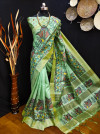 Pista green color tussar silk saree with kalamkari printed work