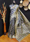 Blue color jamdani raw silk saree with woven design