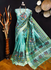 Sky blue color tussar silk saree with kalamkari printed work