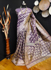 Magenta color raw silk saree with woven design