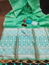Sea green color tussar silk saree with zari weaving work