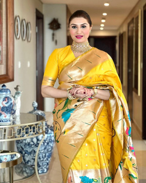 Yellow color phithani silk saree with zari weaving work