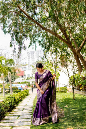 Magenta color handloom raw silk saree with woven design