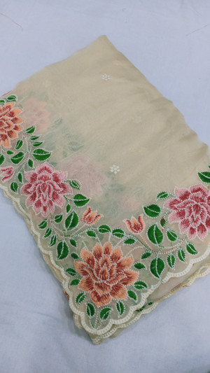 Off white color organza silk saree with embroidery work
