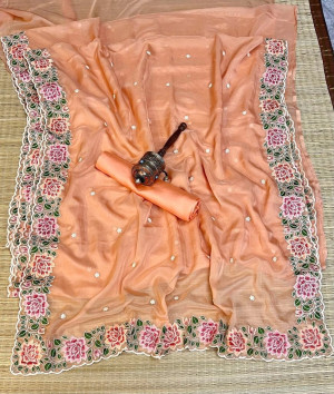 Peach  color organza silk saree with embroidery work