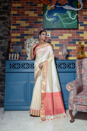 Off white color tussar silk saree with zari weaving work