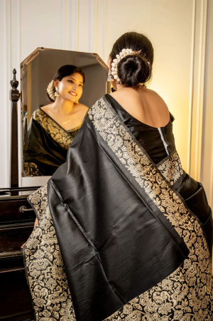 Black color handloom raw silk saree with woven design