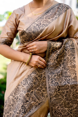 Beige color handloom raw silk saree with woven design