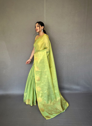 Parrot green color tissue silk saree with zari weaving work