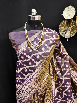 Magenta color raw silk saree with woven design