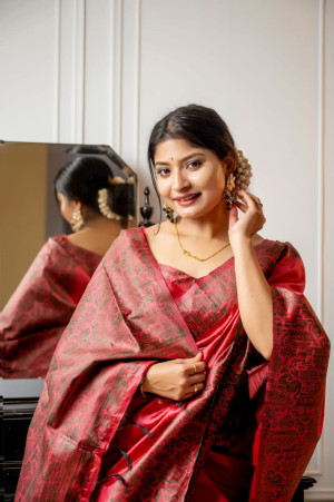 Gajari color handloom raw silk saree with woven design