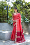 Peach color tussar silk saree with zari weaving temple border