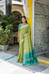 Parrot green color tussar silk saree with zari weaving temple border