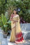 Beige color tussar silk saree with zari weaving temple border
