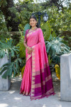 Pink color tussar silk saree with zari weaving temple border