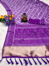 Purple flowy dola silk saree with bandhej woven border & lagdi patta pallu