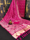 Pink flowy dola silk saree with patola woven design border & lagdi patta pallu