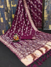 Magenta flowy dola silk saree with lehriya woven design border & lagdi patta pallu