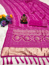 Pink flowy dola silk saree with bandhej woven border & lagdi patta pallu