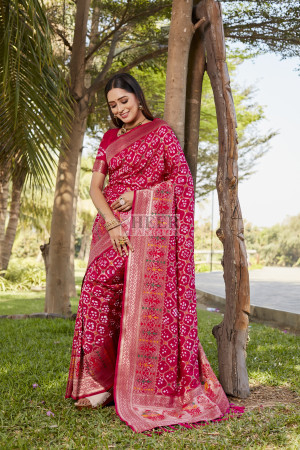 Pink color bandhej silk saree with zari weaving work
