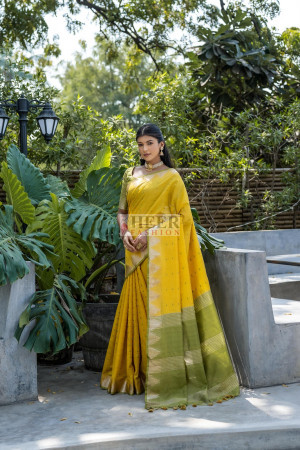 Yellow color tussar silk saree with zari weaving temple border