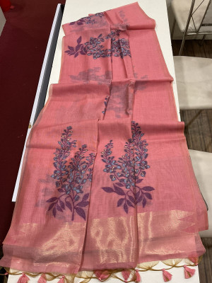 Pink soft muga silk saree with floral weaving work