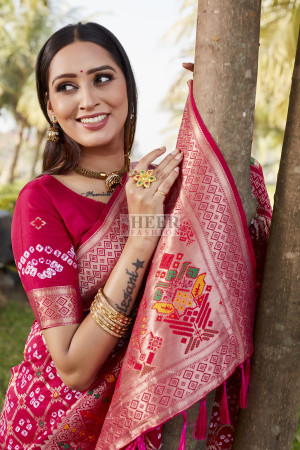 Pink color bandhej silk saree with zari weaving work